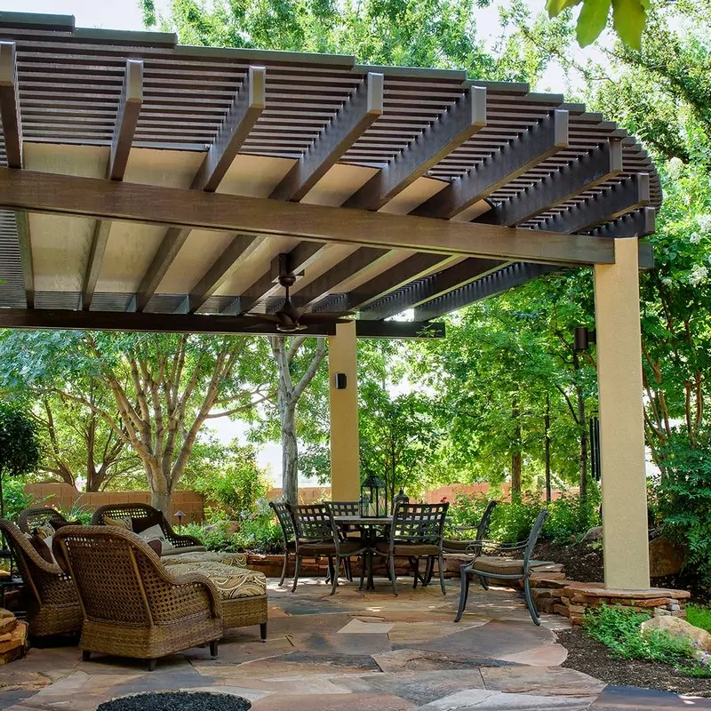 Custom white pergola awnings for patios in San Diego backyard.